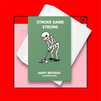 Funny golf birthday card showing a cartoon skeleton putting a golf ball with the words “Stroke Game Strong” and “Happy Birthday” on a green background.