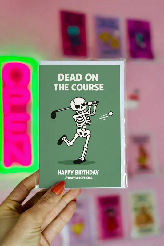 Funny golf birthday card showing a cartoon skeleton swinging a golf club with the words “Dead on the Course” and “Happy Birthday” on a green background.