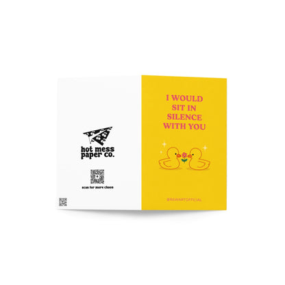 Cute romantic card featuring two small ducks with a flower and text “I would sit in silence with you” on a yellow background