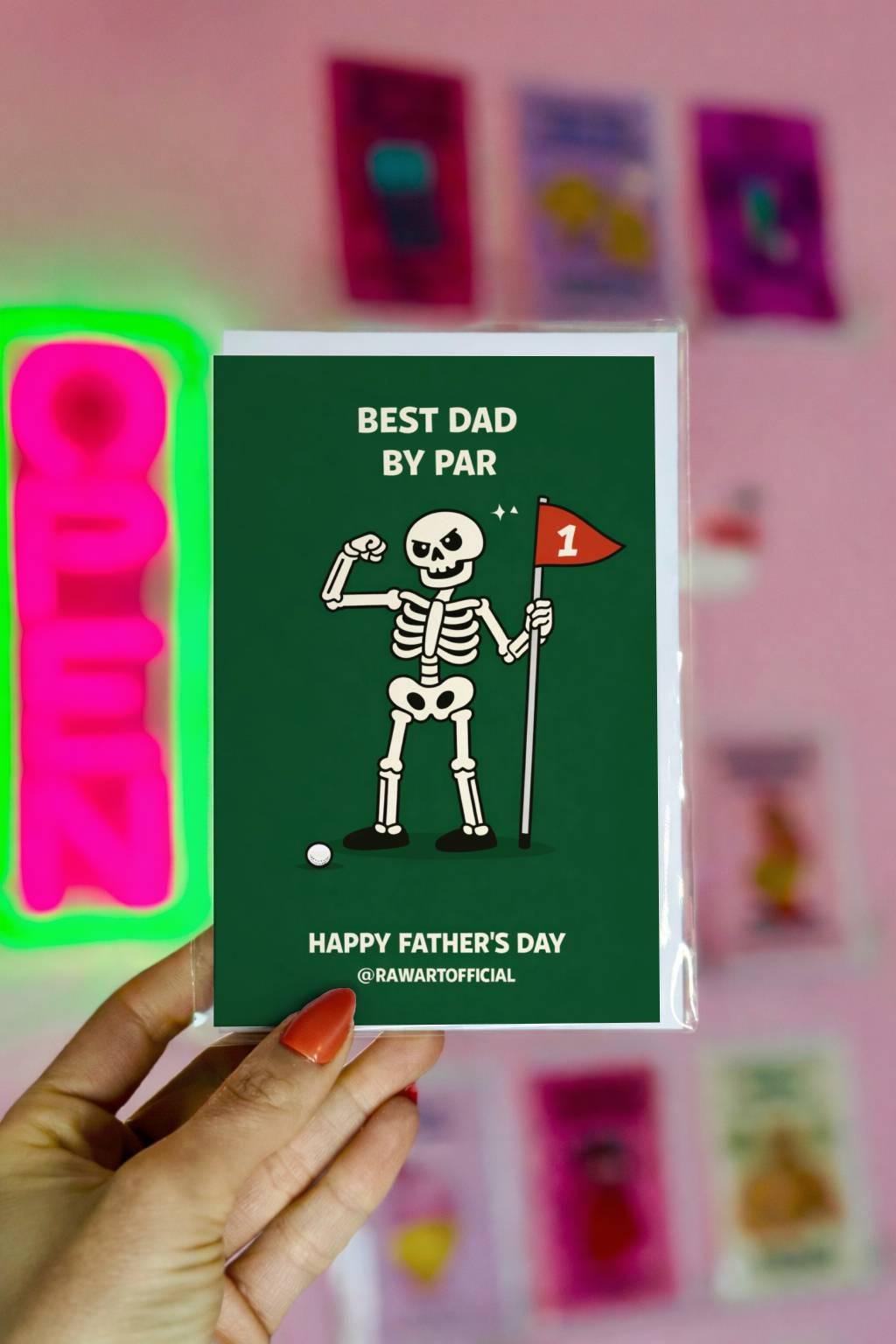 Funny Fathers Day golf dad card with skeleton holding flag and text “Best Dad by Par” on green background