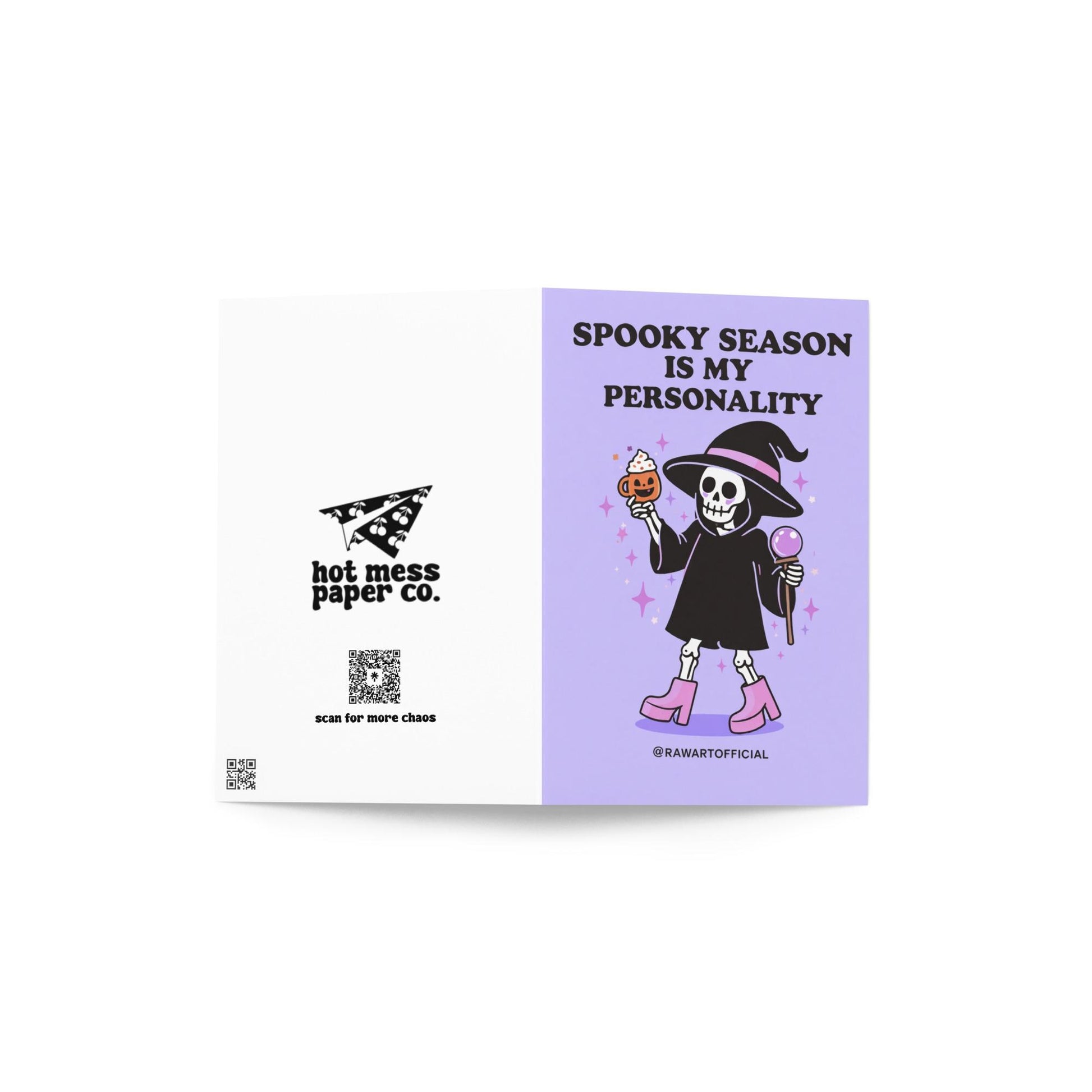 Spooky greeting card with skeleton in witch hat holding pumpkin drink and crystal ball with text “Spooky season is my personality” on purple background