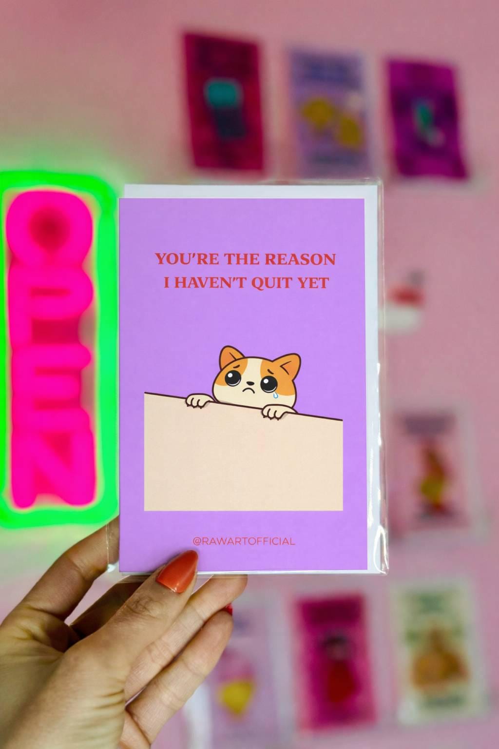 Funny coworker card with text “you’re the reason I haven’t quit yet” on a pastel background