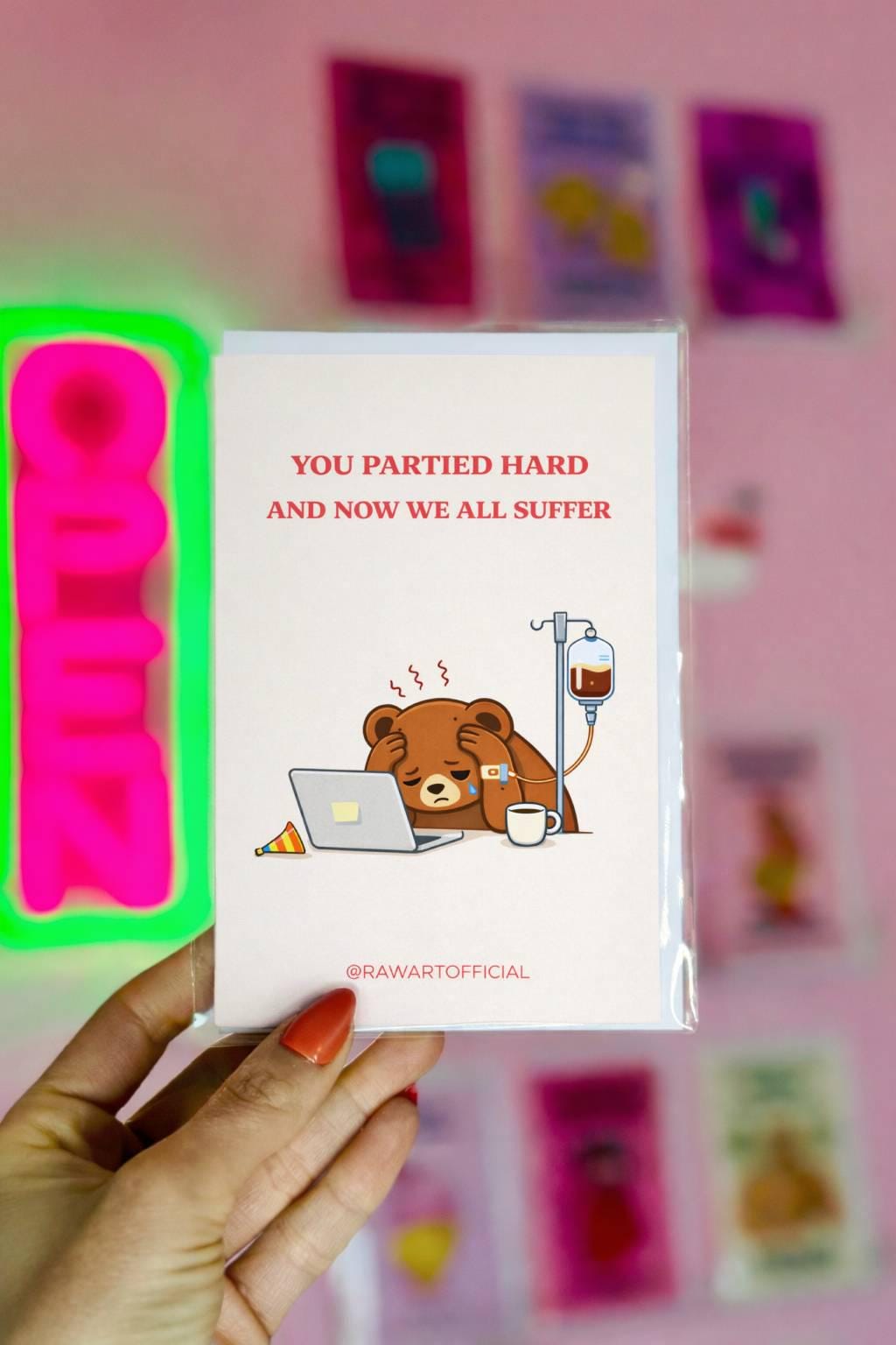 Funny coworker birthday design with text “you partied hard and now we all suffer” featuring a tired bear at a desk