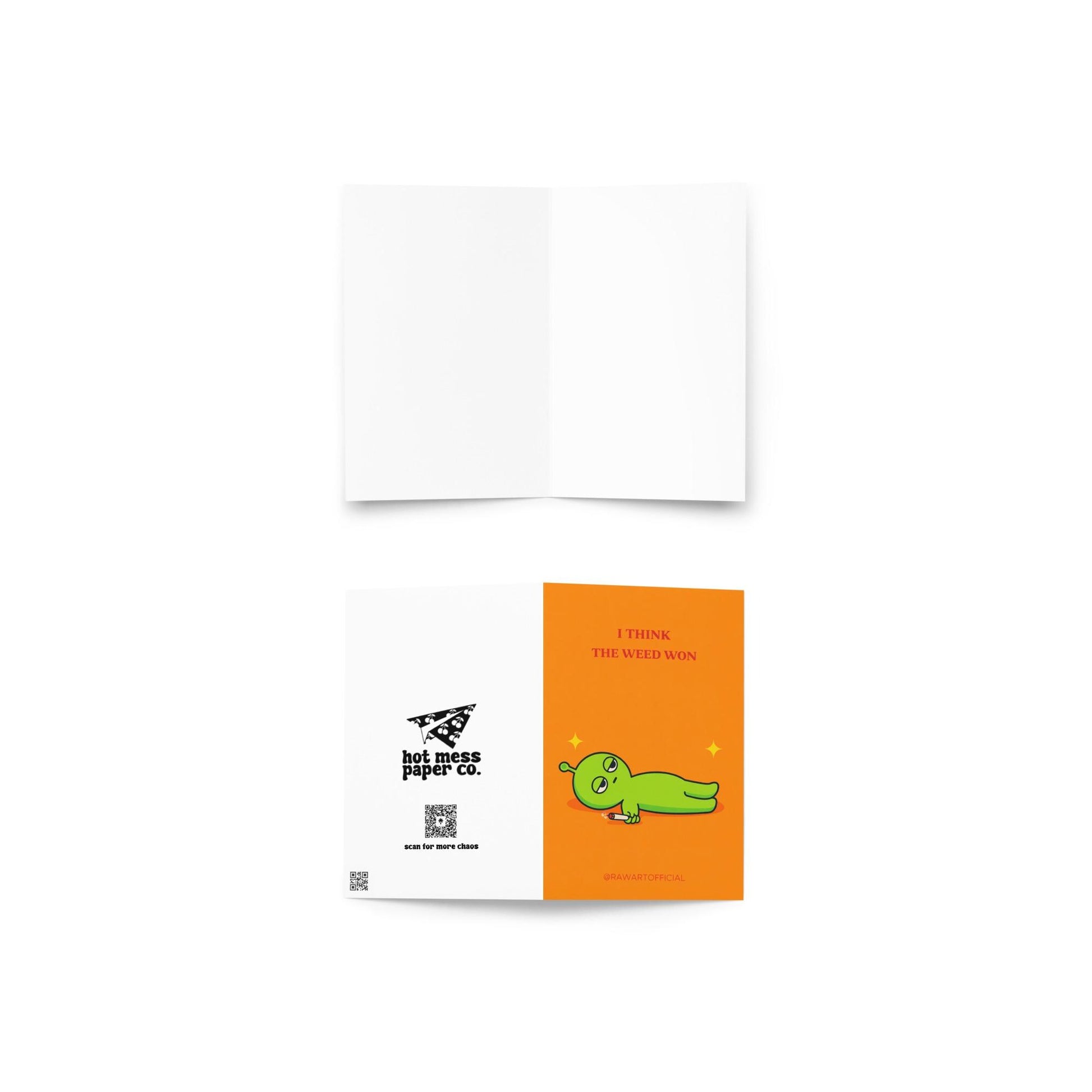 Funny stoner greeting card with green alien lying down holding joint, text says “I think the weed won” on orange background