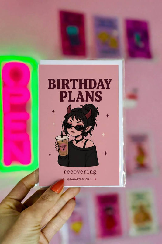 Funny spooky birthday card with goth devil girl wearing sunglasses holding iced coffee, text reads “birthday plans recovering”