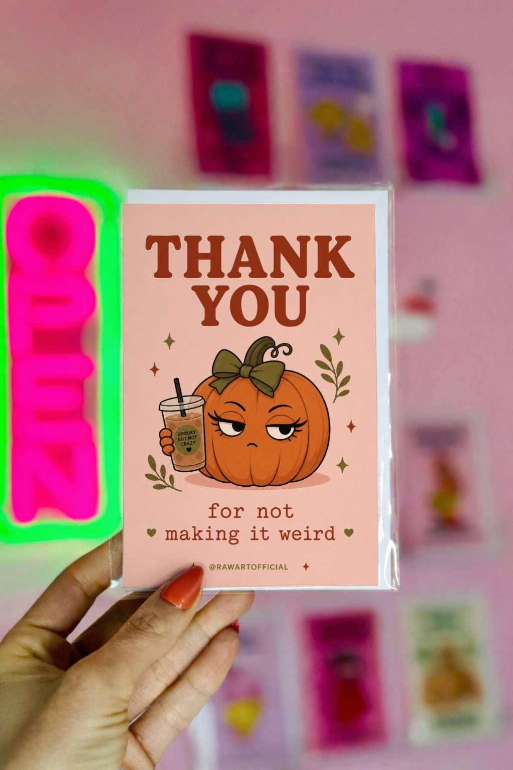 Funny thank you card with cute pumpkin holding iced coffee, text reads “thank you for not making it weird”