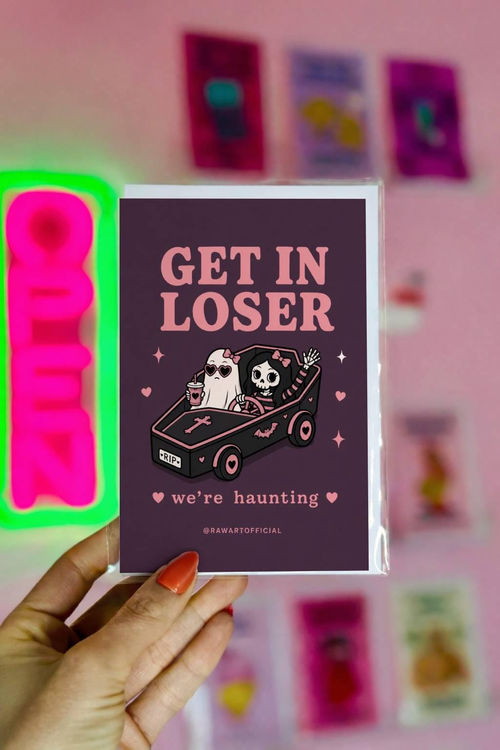Funny spooky card with skeleton and ghost in hearse saying get in loser we are haunting