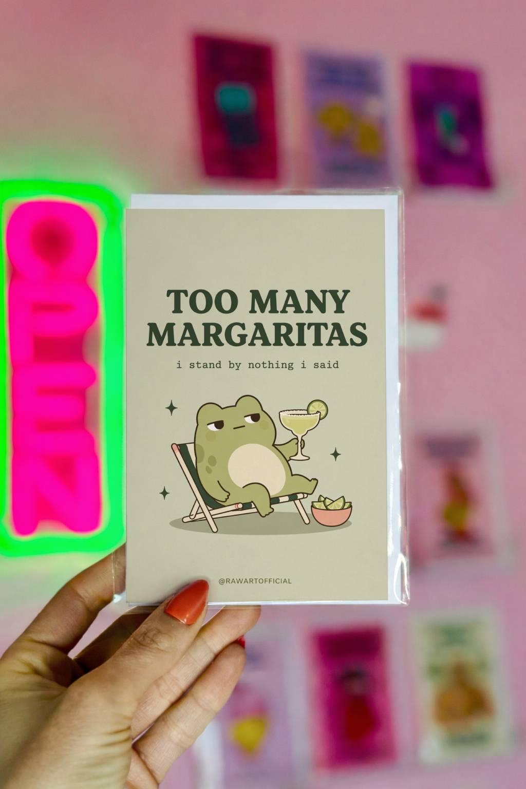 Funny drinking greeting card with a frog holding a margarita and text “Too many margaritas I stand by nothing I said” on a neutral background