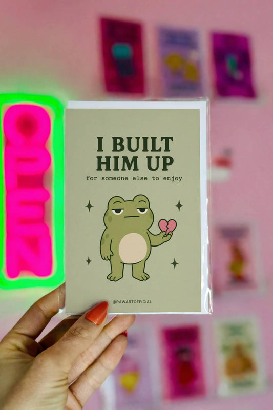 Frog holding broken heart with text “I built him up for someone else to enjoy”