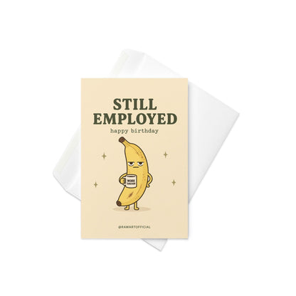 Funny coworker birthday greeting card with tired banana holding mug that says work survivor, text reads “Still employed happy birthday”