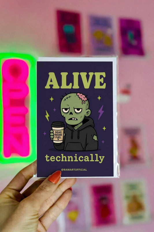 Funny zombie birthday card holding coffee, text says “alive technically”