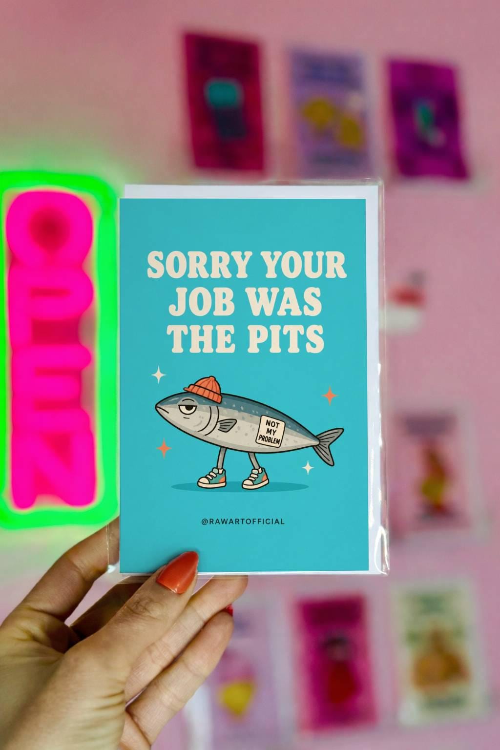 Funny quitting job card with a sardine in sneakers and a beanie beside the phrase “Sorry Your Job Was The Pits.”