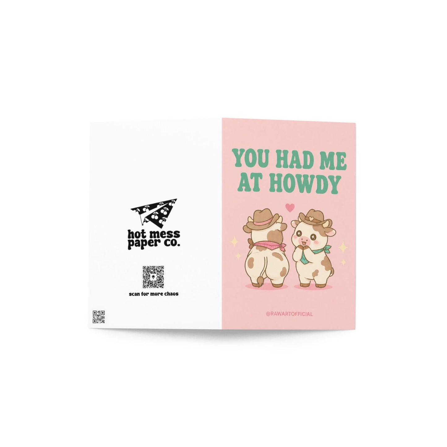 Funny love card featuring two adorable cowboy cows beside the phrase “You Had Me At Howdy,” including one cheeked-up cow and a heart above them.