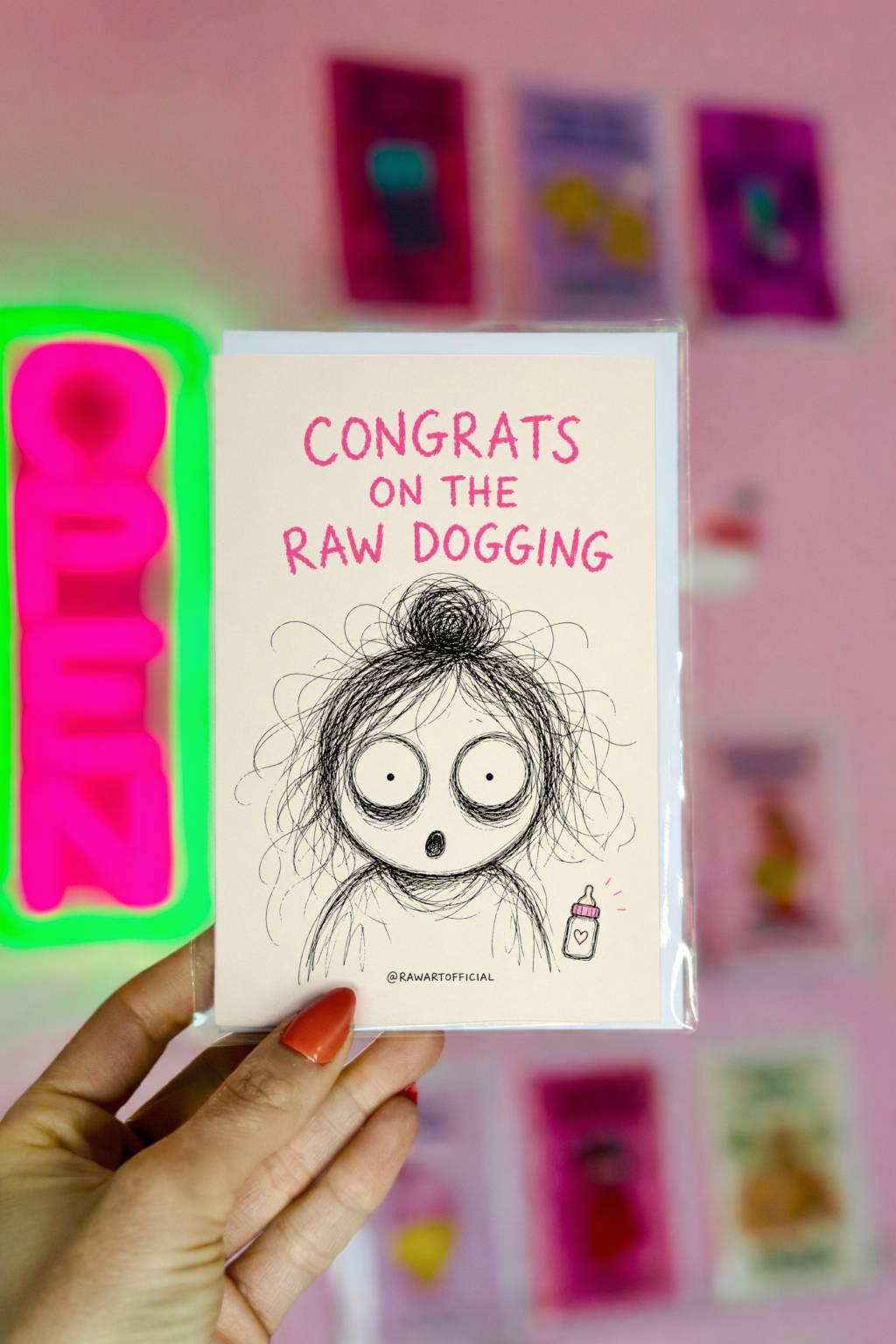 Funny pregnancy greeting card featuring a shocked scribble character beside the phrase “Congrats on the Raw Dogging” with humorous inside artwork.