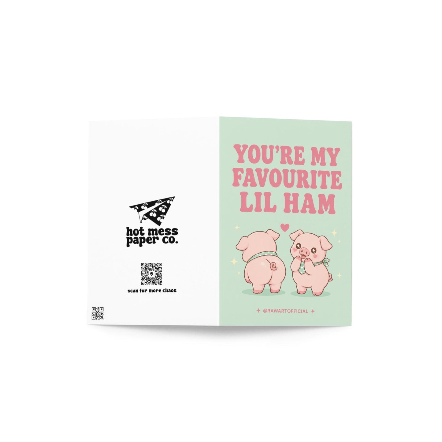 Funny love card featuring two adorable pigs beside the phrase “You’re My Favourite Lil Ham,” including one cheeked-up pig and a heart above them.