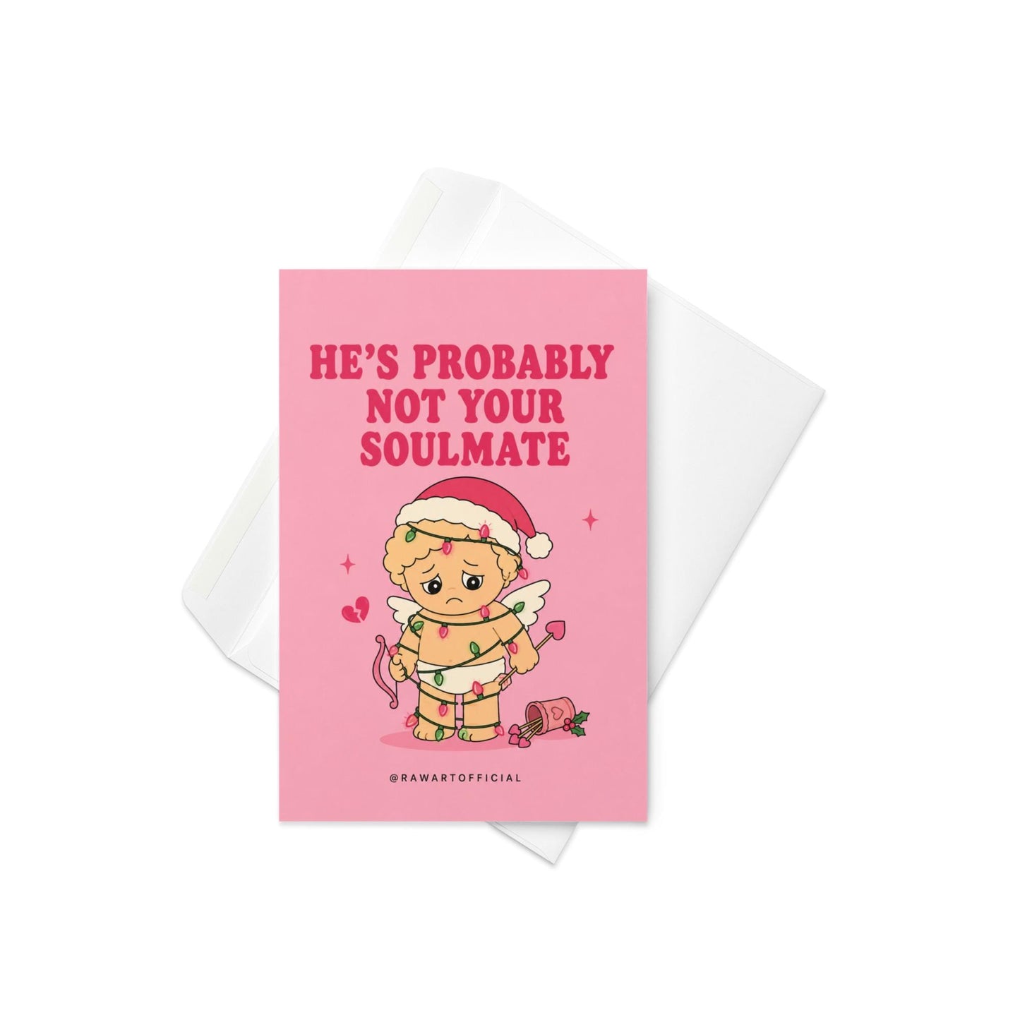 Funny Christmas card featuring a sad cupid tangled in Christmas lights beside the phrase “He’s Probably Not Your Soulmate.”