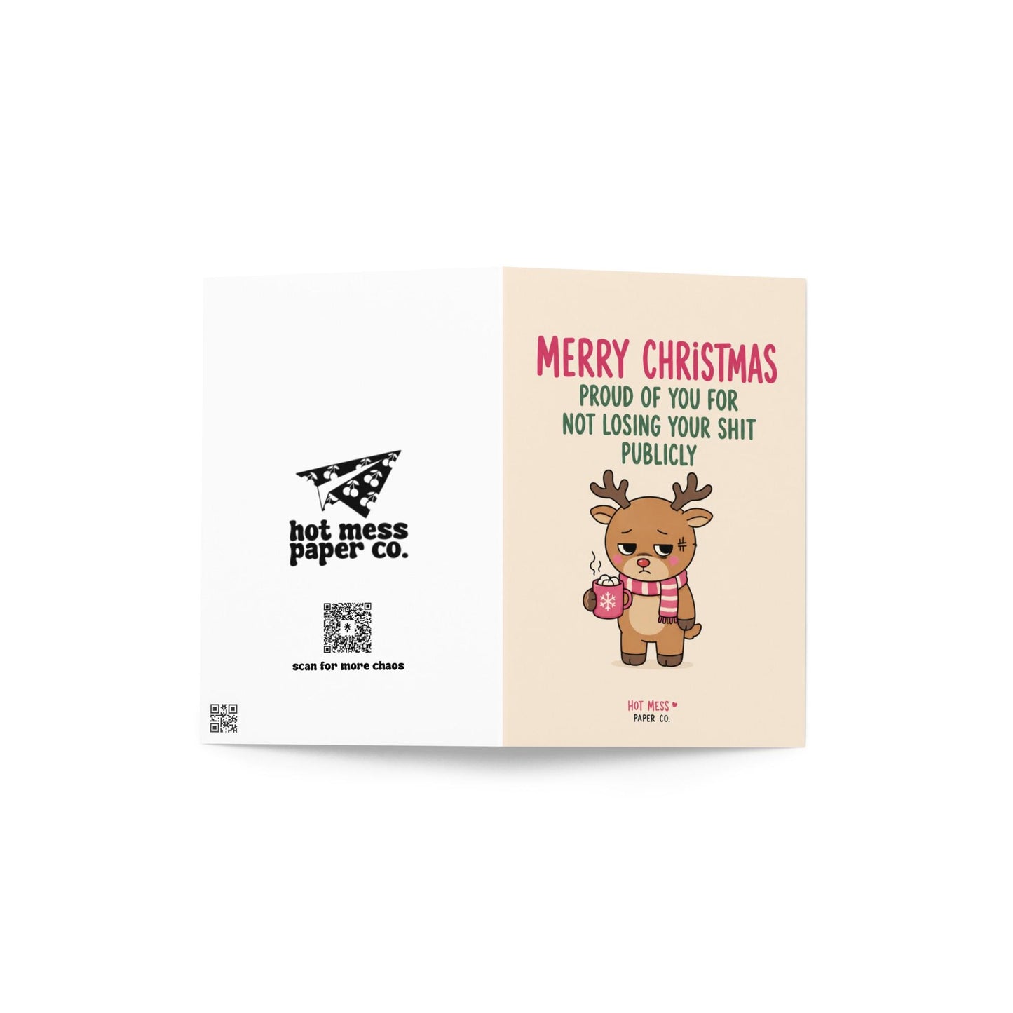 Funny Christmas card featuring a tired reindeer holding hot cocoa beside the phrase “Proud Of You For Not Losing Your Shit Publicly.”