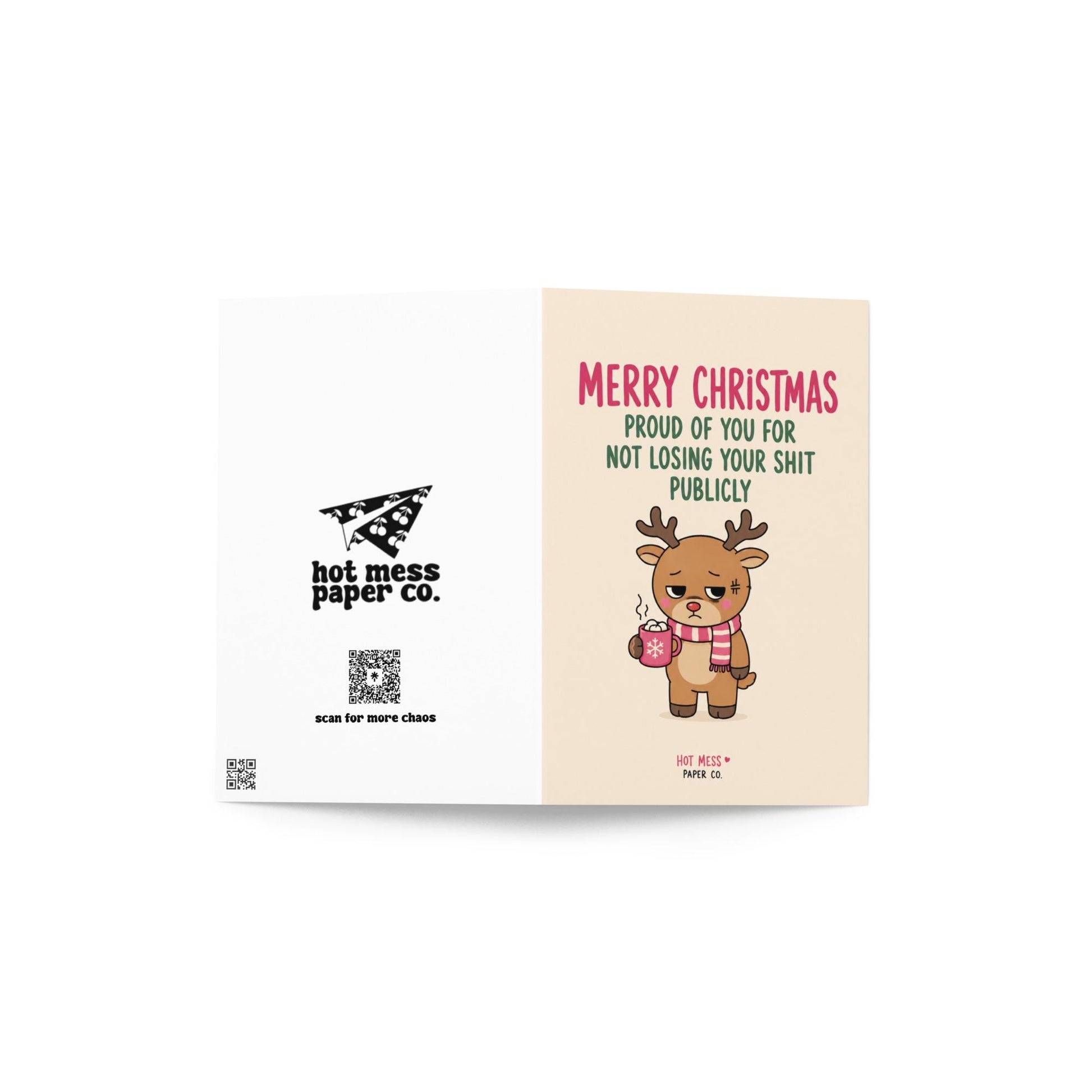 Funny Christmas card featuring a tired reindeer holding hot cocoa beside the phrase “Proud Of You For Not Losing Your Shit Publicly.”