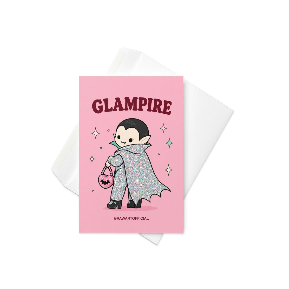 Pink Halloween greeting card reading "Glampire" featuring a cute glittery vampire wearing a glamorous cape and heels while carrying a pink heart-shaped bat purse surrounded by sparkles.