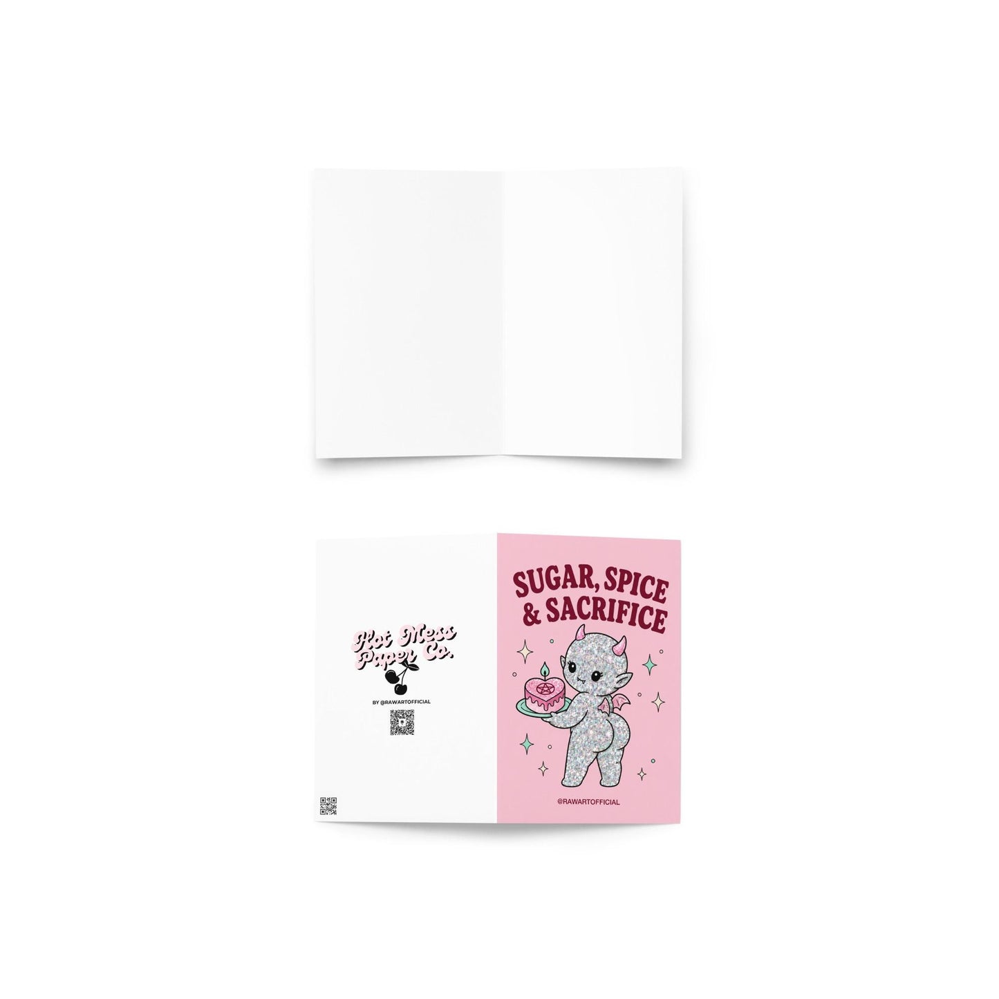 Pink funny Halloween greeting card reading “Sugar, Spice & Sacrifice” with a glittery cute devil holding a pink cake with a pentagram, photographed against a colorful pink card display.