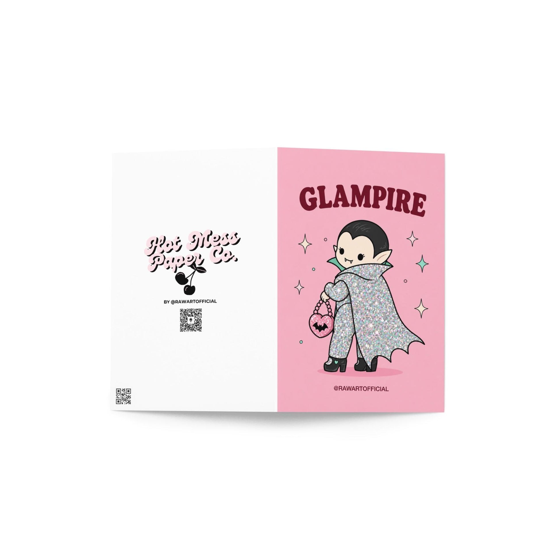 Pink Halloween greeting card reading "Glampire" featuring a cute glittery vampire wearing a glamorous cape and heels while carrying a pink heart-shaped bat purse surrounded by sparkles.