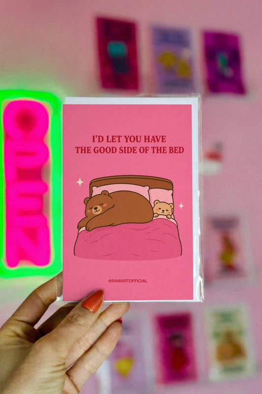 Funny anniversary card featuring a large bear taking up most of a bed while a smaller bear is squeezed to the side beneath the phrase “I’d Let You Have the Good Side of the Bed.”