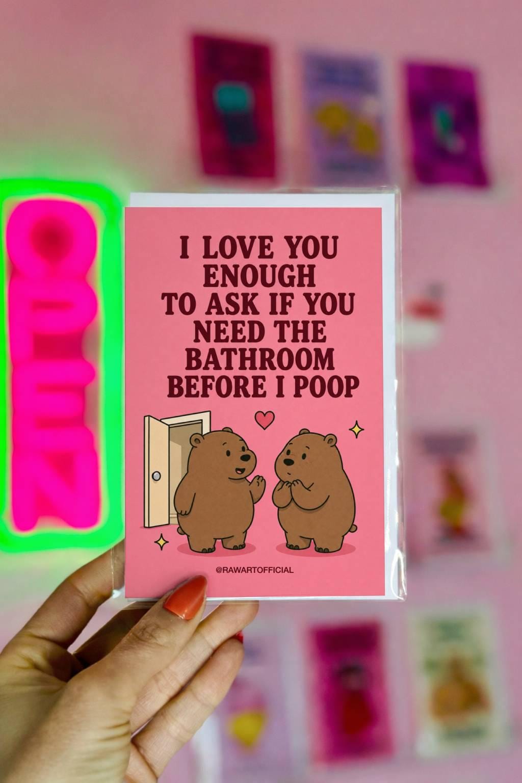 Funny bathroom humor card featuring two bears beside an open door beneath the phrase “I Love You Enough to Ask If You Need the Bathroom Before I Poop.”