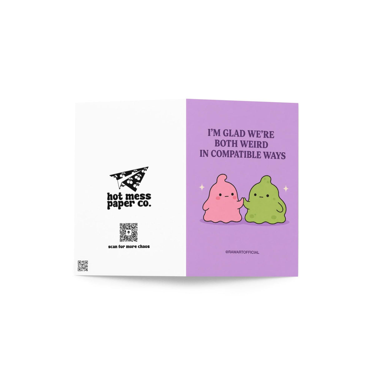 Funny love card featuring pink and green blob characters holding hands beneath the phrase “I’m Glad We’re Both Weird in Compatible Ways.”
