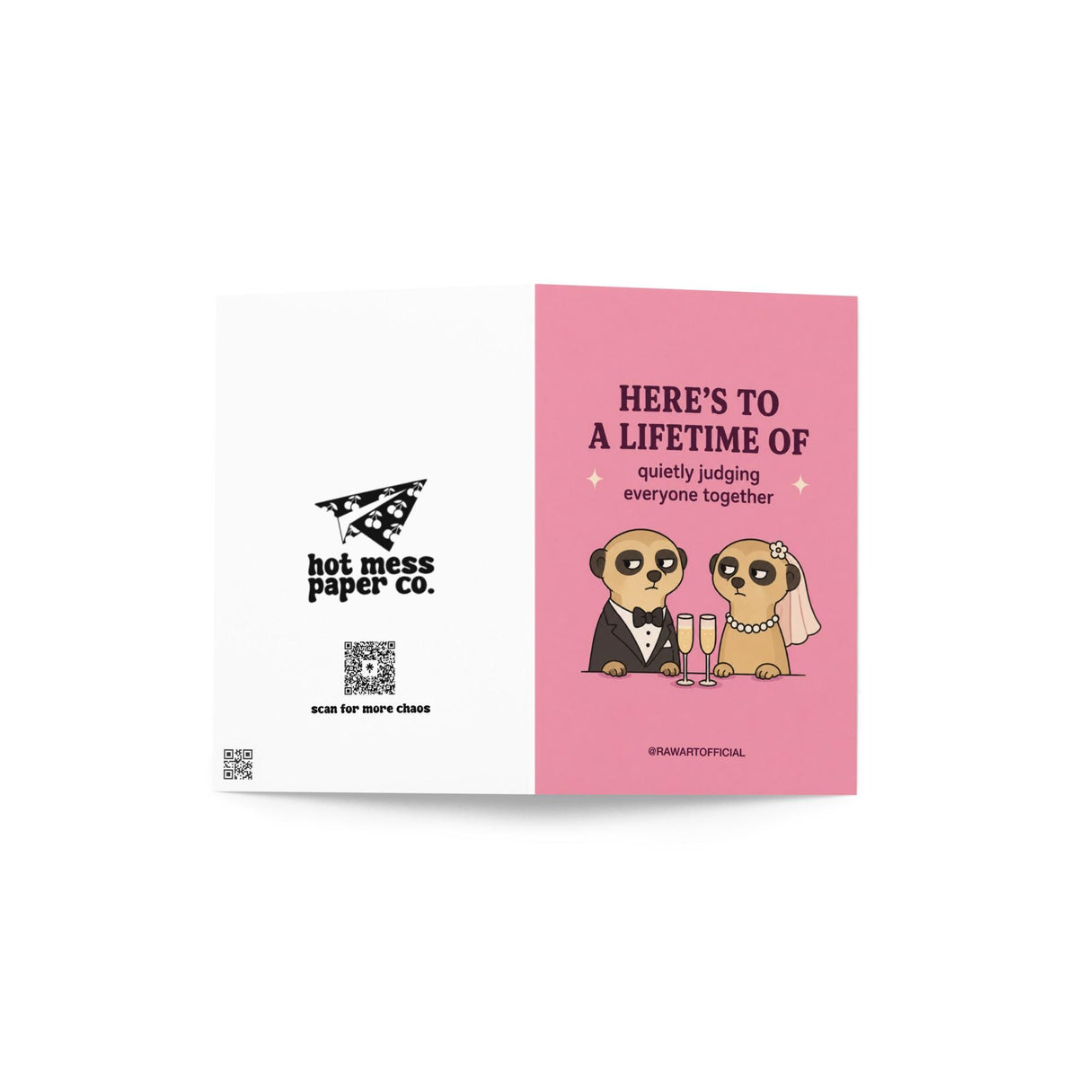 Funny wedding card featuring a bride and groom meerkat couple sharing judgmental looks over champagne with the phrase “Here’s to a Lifetime of Quietly Judging Everyone Together.”