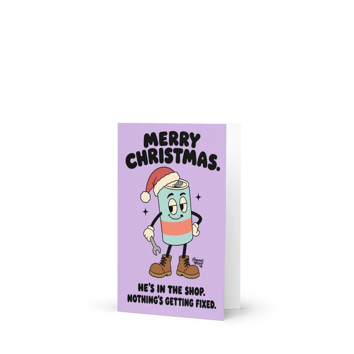 Funny Christmas greeting card featuring a cartoon energy drink can wearing a red Santa hat, brown work boots, and white gloves while holding a wrench. Pastel lavender background with bold black retro lettering reading “Merry Christmas. He's in the Shop. Nothing's Getting Fixed.” Humorous holiday card for mechanics, oilfield workers, tradesmen, and garage enthusiasts.