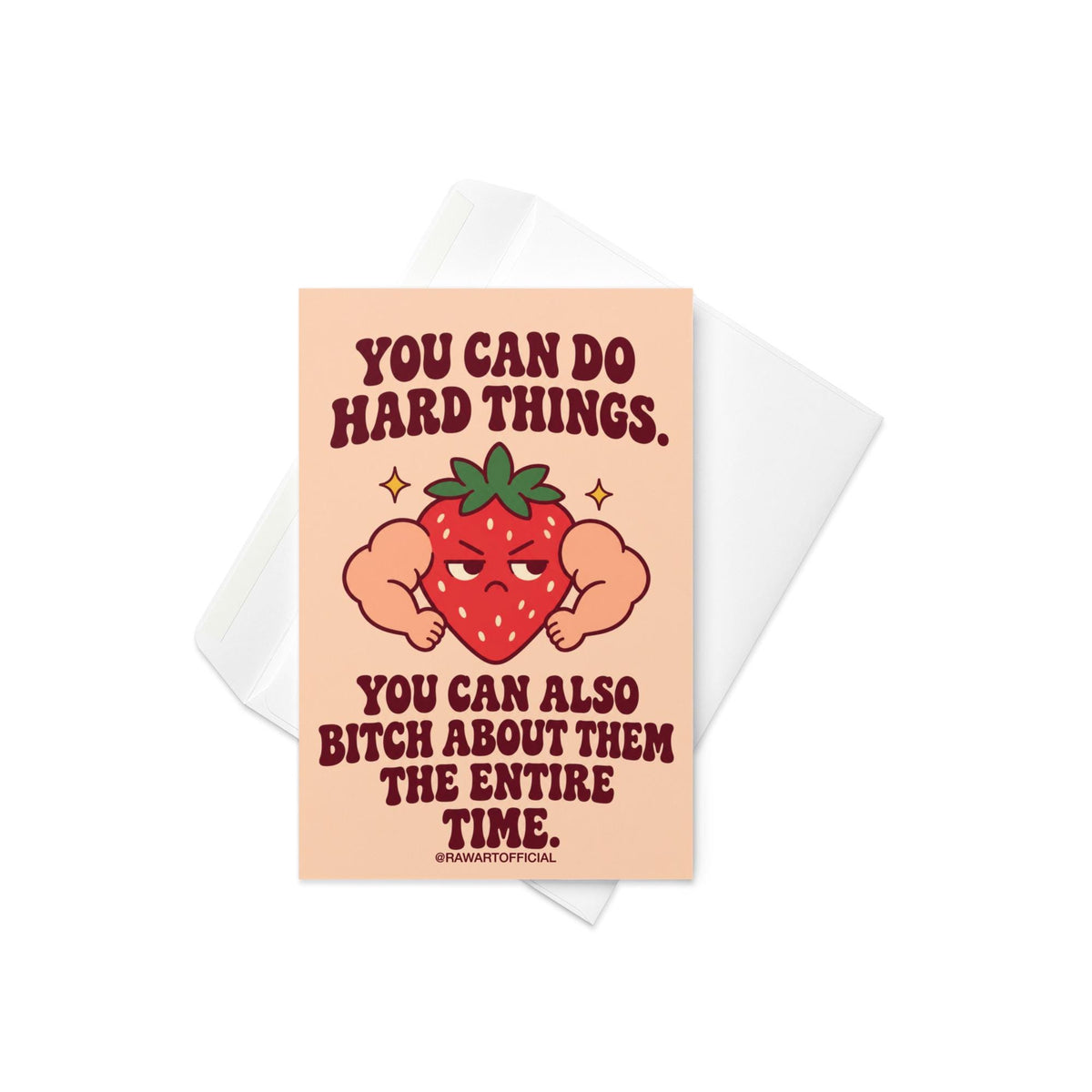 Funny encouragement greeting card featuring a grumpy red cartoon strawberry with oversized flexing muscular arms, green leaves, and golden sparkles. Soft peach background with bold dark burgundy retro lettering reading “You Can Do Hard Things. You Can Also Bitch About Them the Entire Time.” Sarcastic motivational card by Hot Mess Paper Co.