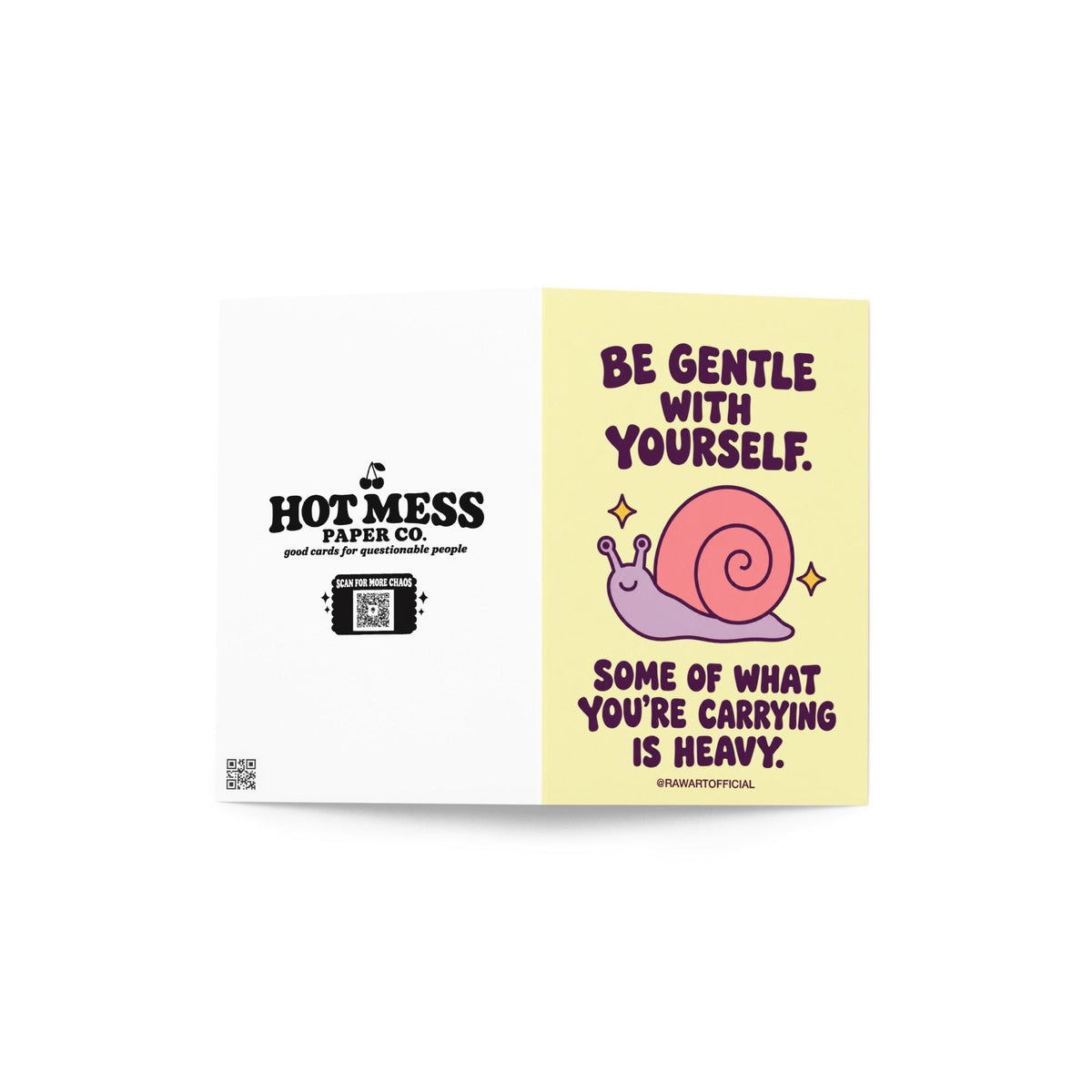 Heartfelt encouragement greeting card with a pastel yellow background and bold dark plum retro lettering reading “Be Gentle With Yourself. Some of What You're Carrying Is Heavy.” Features a smiling lavender snail with a large pink spiral shell and two golden sparkles. Gentle thinking-of-you and emotional support card by Hot Mess Paper Co.