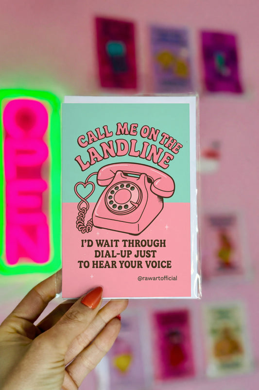 Funny retro love card with pink rotary phone and text “Call Me On The Landline. I’d wait through dial-up just to hear your voice.”