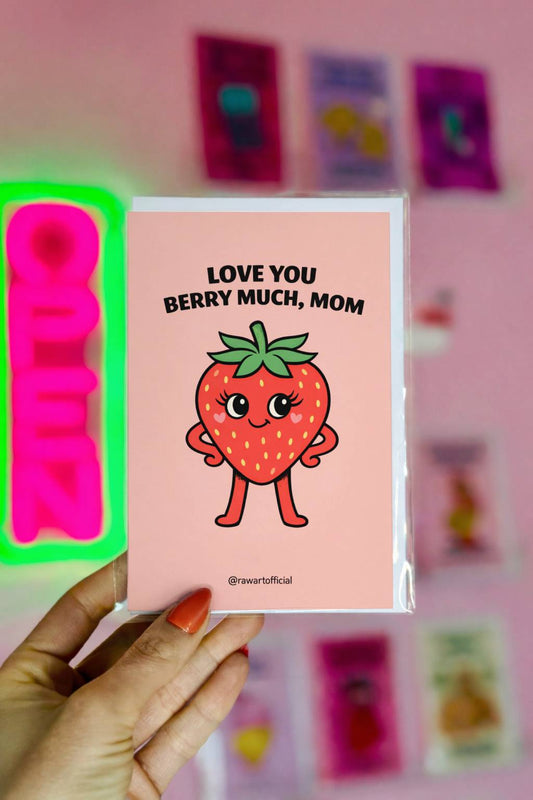 Mother’s Day greeting card featuring a cute strawberry illustration with the text “Love You Berry Much, Mom” on a soft pink background.