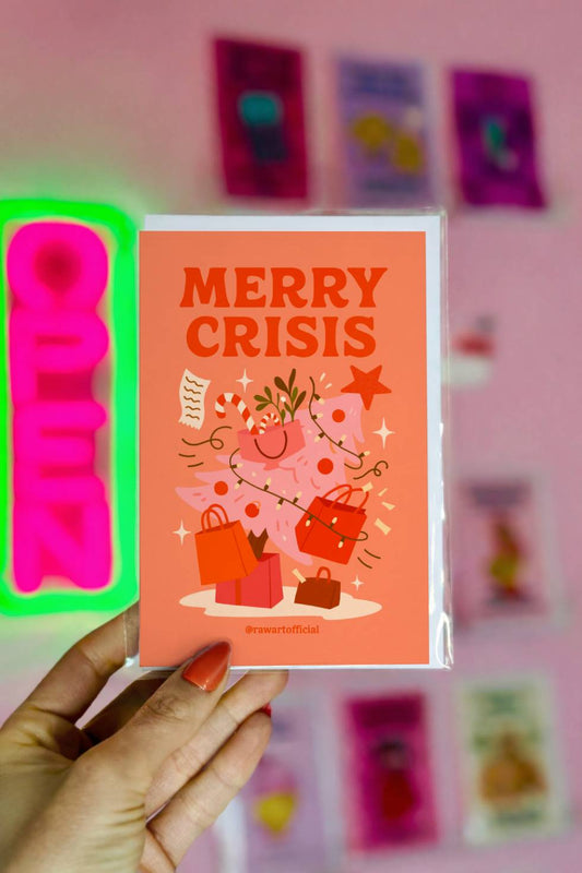 Funny Christmas greeting card with a chaotic Christmas tree full of shopping bags and decorations with the phrase “Merry Crisis.”