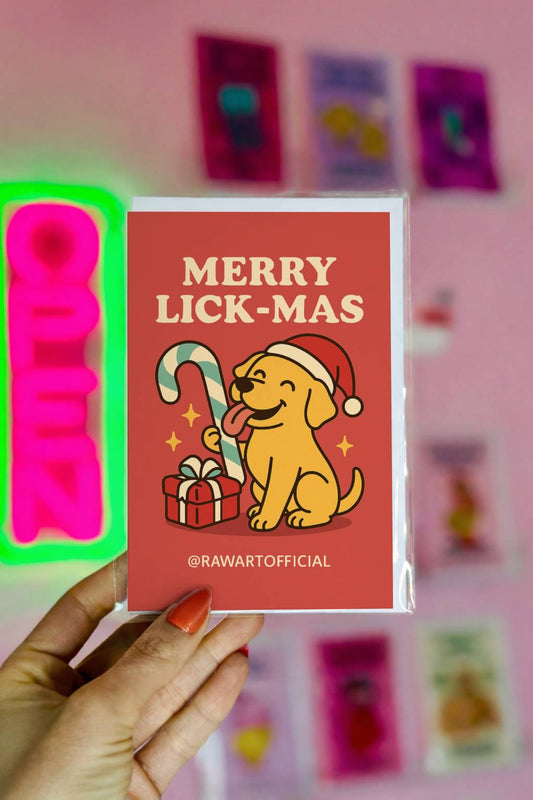 Funny Christmas card featuring a Labrador dog in a Santa hat licking a candy cane with text “Merry Lickmas” in a retro style design
