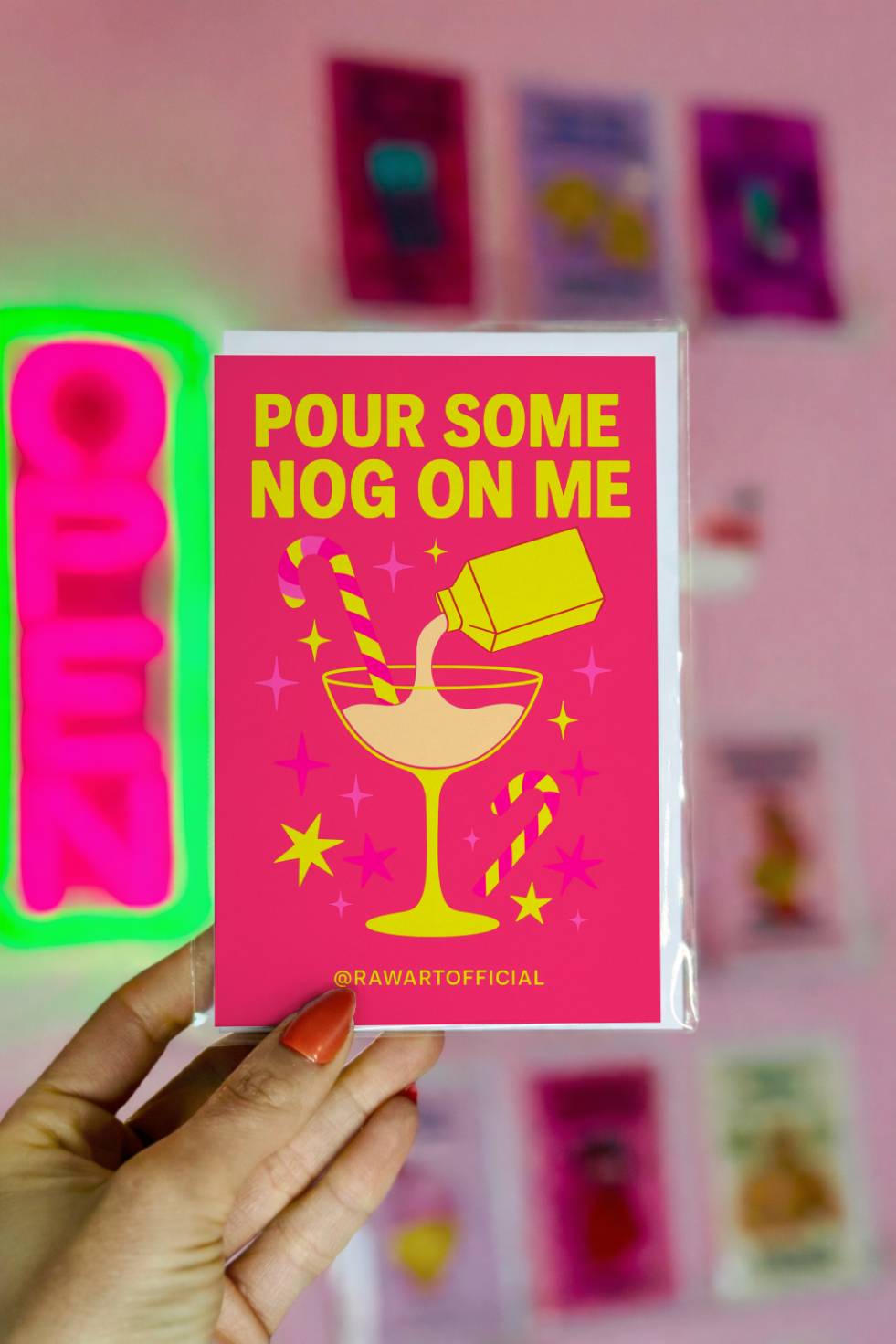 Funny Christmas greeting card with eggnog cocktail and text “Pour Some Nog on Me.”