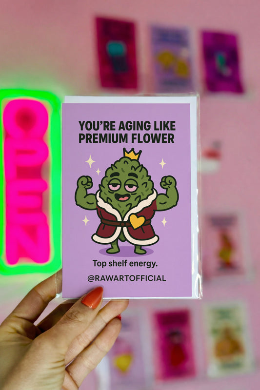 Buff weed nug wearing crown and robe flexing muscles on purple background, stoner birthday card.