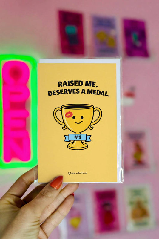 Mother’s Day card featuring a smiling gold trophy with a #1 ribbon and the text “Raised Me. Deserves a Medal.” on a yellow background.