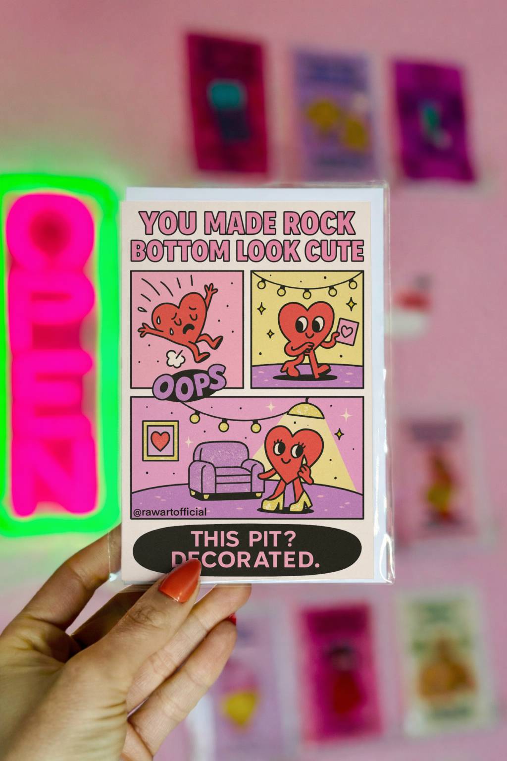 Pastel comic style encouragement card reading You Made Rock Bottom Look Cute with heart character panels.