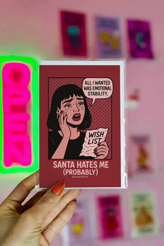 Funny Christmas greeting card showing a retro comic-style woman crying while holding a wish list with the text “Santa Hates Me Probably.”