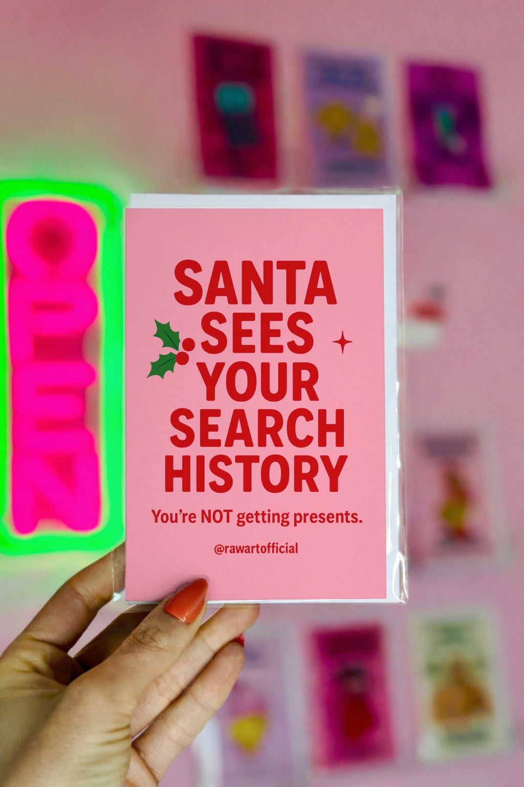 Pink card with bold red text reading “Santa Sees Your Search History — You’re NOT getting presents.”