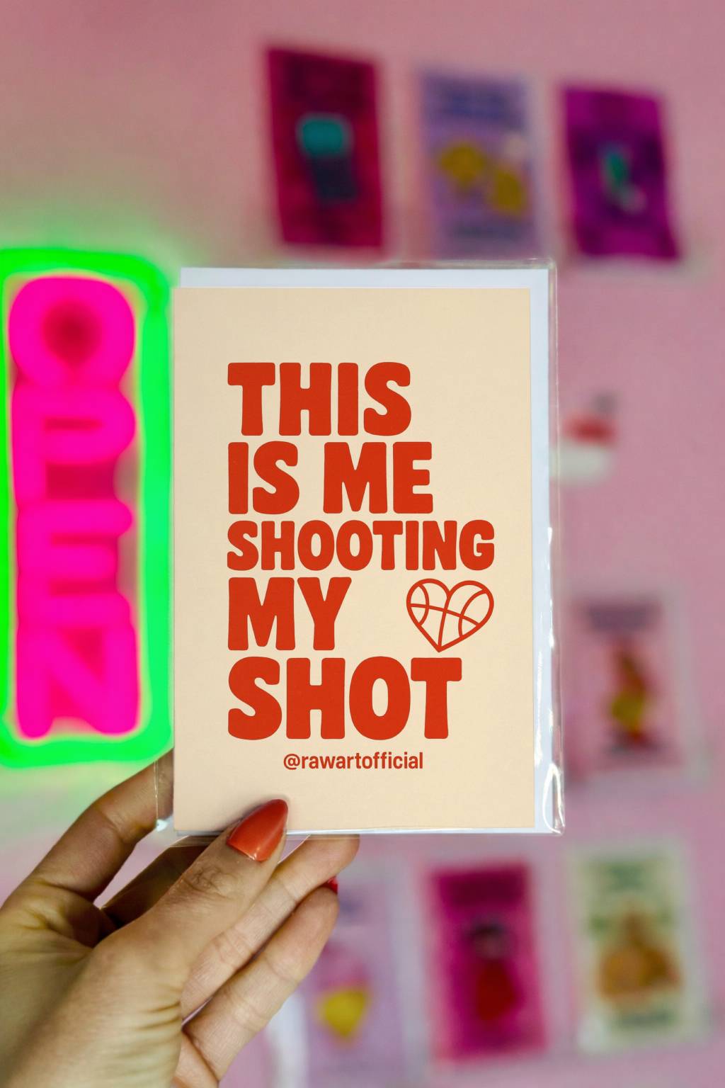 Cream greeting card with bold red retro typography reading This Is Me Shooting My Shot and @rawartofficial at bottom.