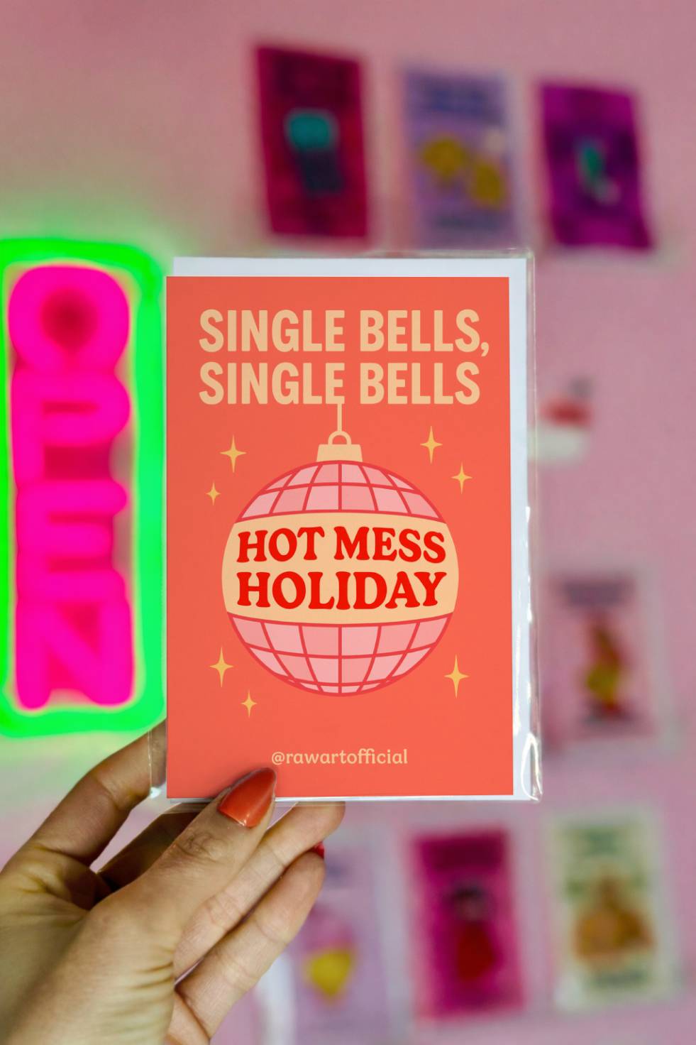 Funny Christmas greeting card with disco ornament and text “Single Bells Hot Mess Holiday.”