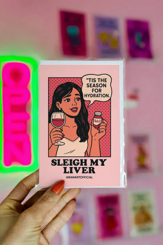 Retro comic-style greeting card with woman holding wine and pills saying “’Tis the season for hydration” with text “Sleigh My Liver.”