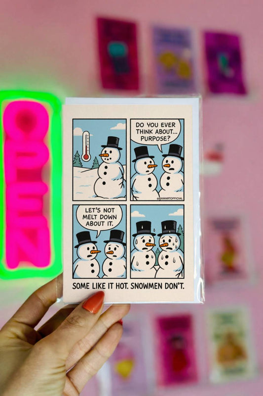 Funny Christmas greeting card comic showing two snowmen discussing their purpose before melting, with the caption “Some Like It Hot. Snowmen Don’t.”