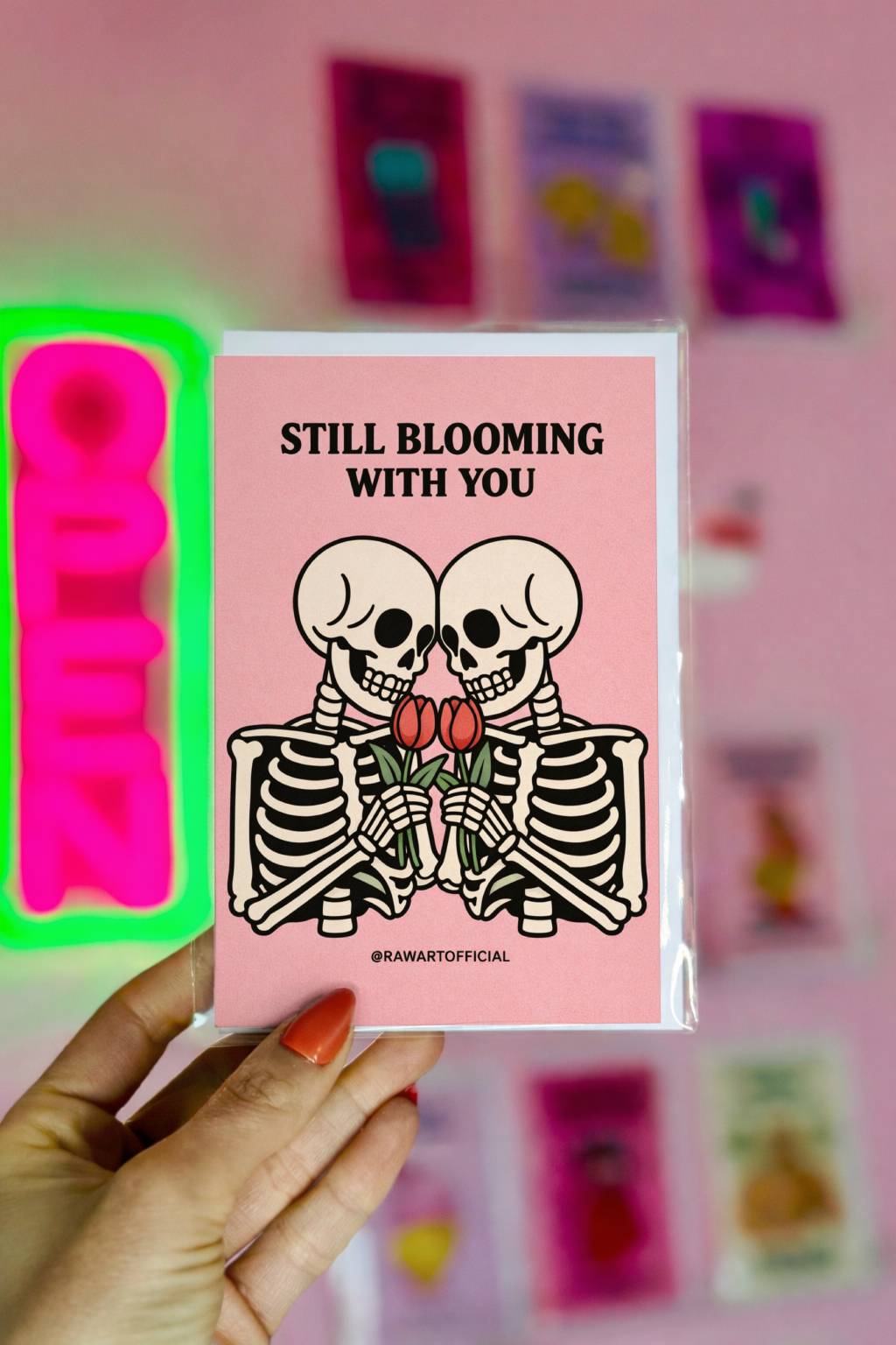 skeleton couple holding tulips spooky spring anniversary card pink background illustration