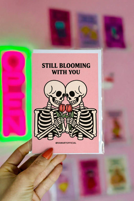 skeleton couple holding tulips spooky spring anniversary card pink background illustration