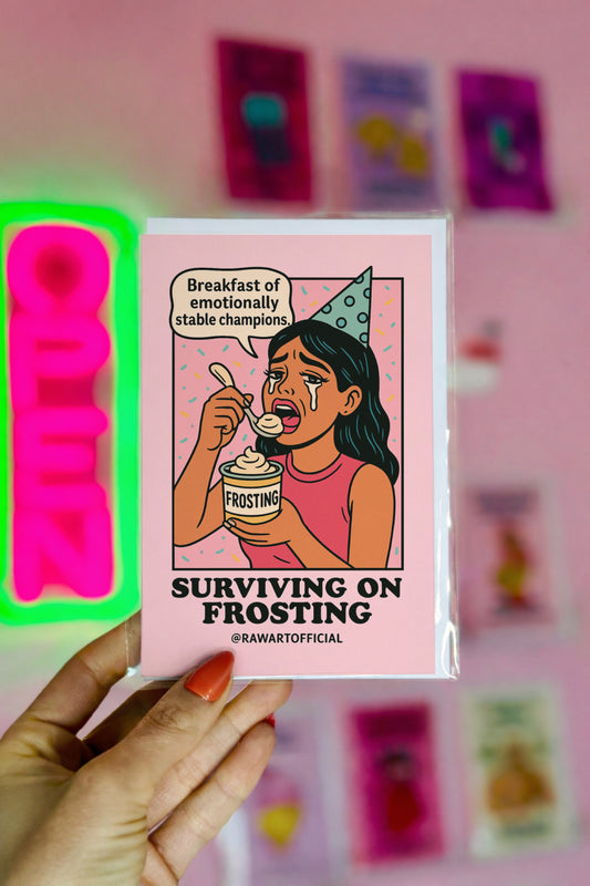 Crying cartoon woman in a party hat eating frosting from a tub with text “Breakfast of emotionally stable champions” and “Surviving on Frosting” below.