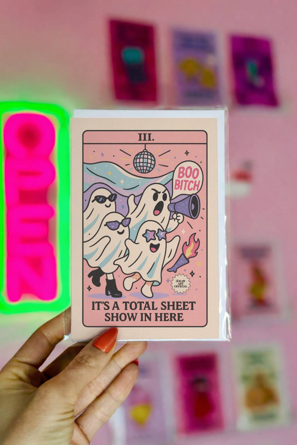 Funny ghost Halloween card with pastel pink background, disco ball, and “Boo Bitch” text – Total Sheet Show design by RAW Art Official.